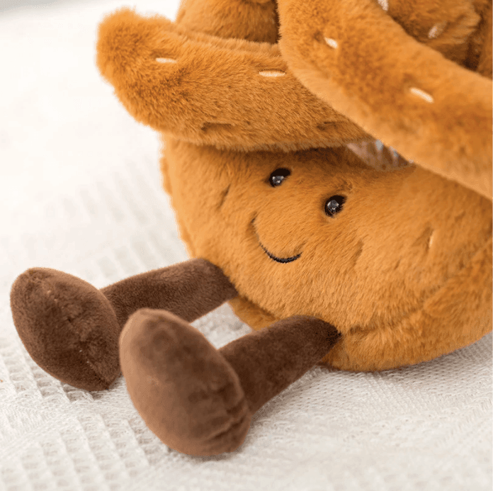Giocattolo in peluche a forma di croissant | Morbido compagno da coccolare a tema cibo