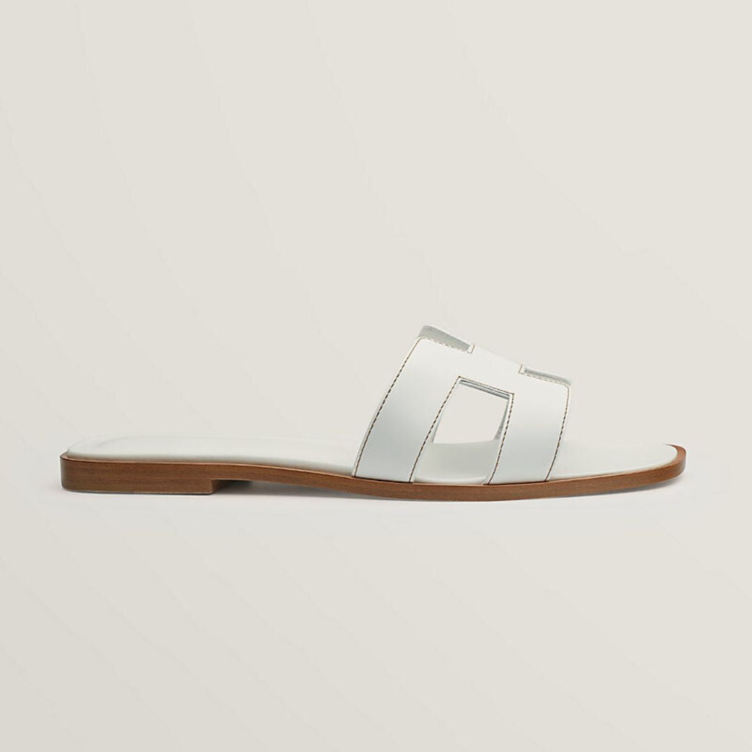 Sandali in pelle senza tempo | Design traforato bianco con suola in legno